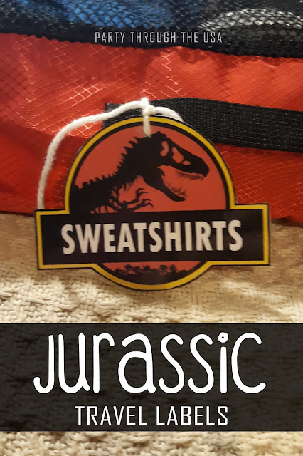 Printable labels for your road trip luggage in the Jurassic Park Logo style